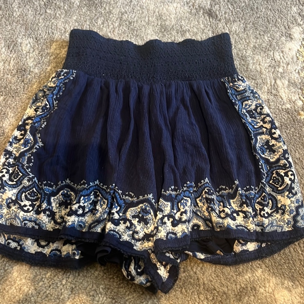 blue shorts with a detail design.